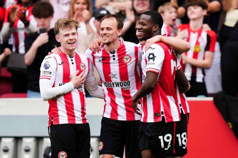 Brentford's Mikkel Damsgaard (centre) celebrates scoring his sides third goal against West Ham.