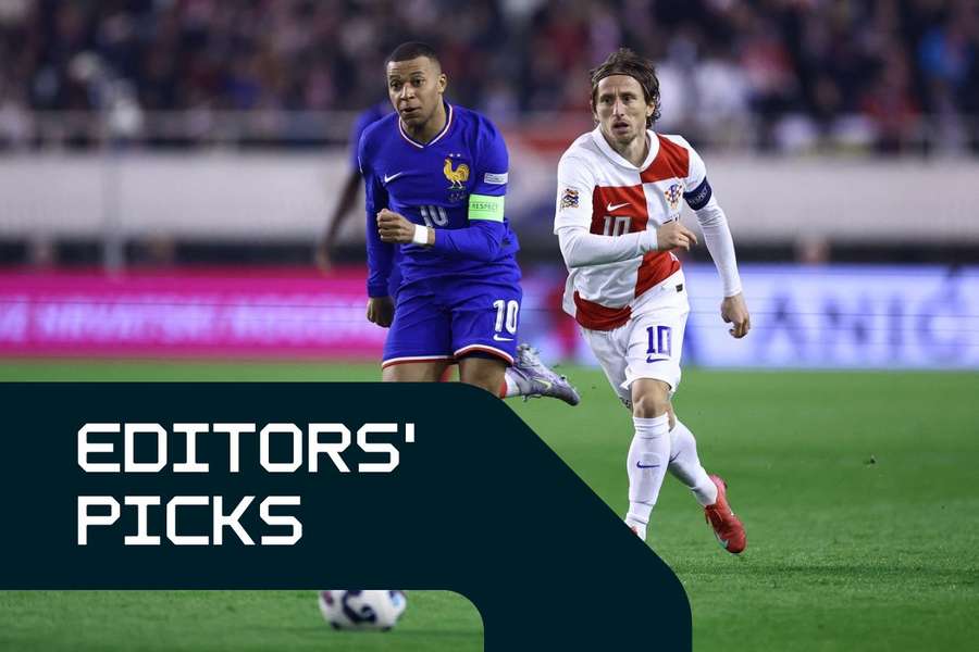 Kylian Mbappe and Luka Modric chase the ball during the first leg of the Nations League quarter-final between France and Croatia