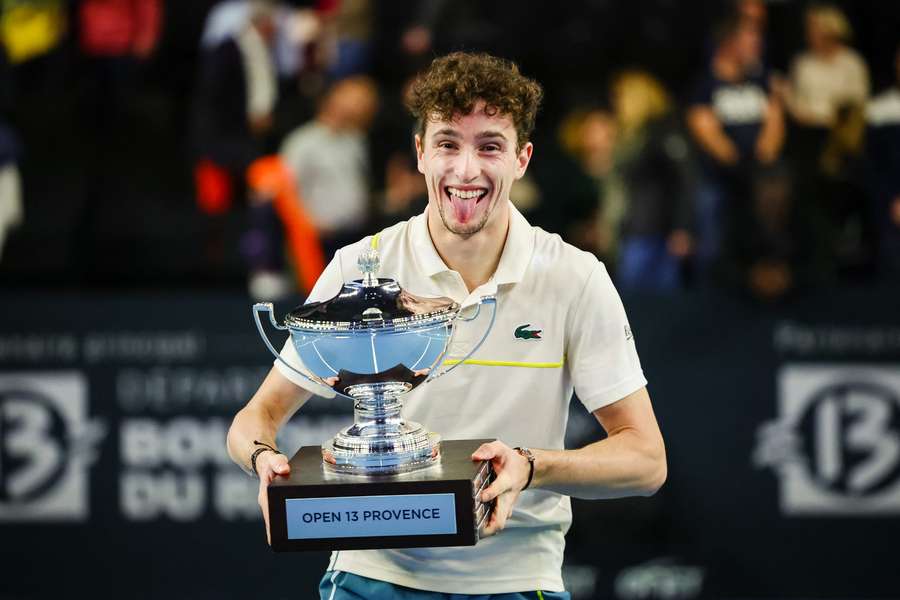 France's Ugo Humbert holds his trophy after winning the ATP Open 13 final