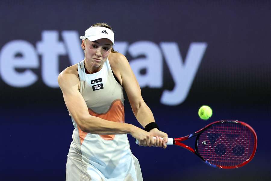 Elena Rybakina of Kazakhstan returns a serve