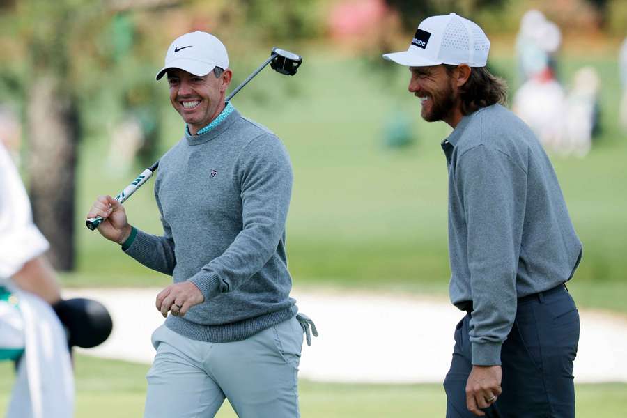 Masters champion McIlroy (L) alongside Tommy Fleetwood Masters champion McIlroy (L) alongside Tommy Fleetwood