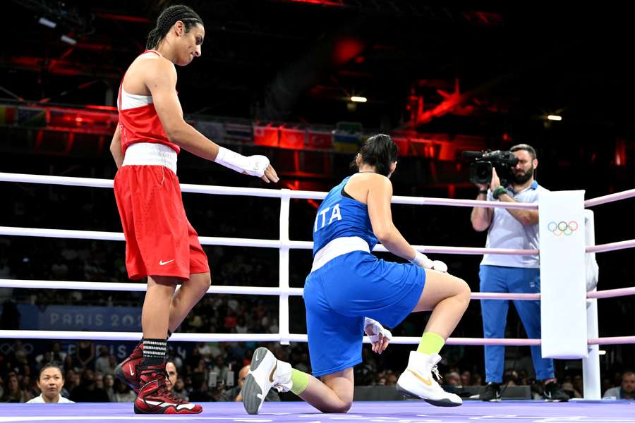 Imane Khelif (L) attempts to console Angela Carini