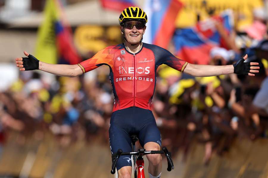 INEOS - Grenadiers' Carlos Rodriguez Cano cycles to the finish line to win the 14th stage