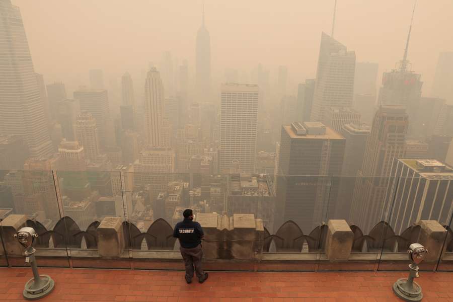Haze and smoke caused by wildfires in Canada hang over the Manhattan skyline, in New York City