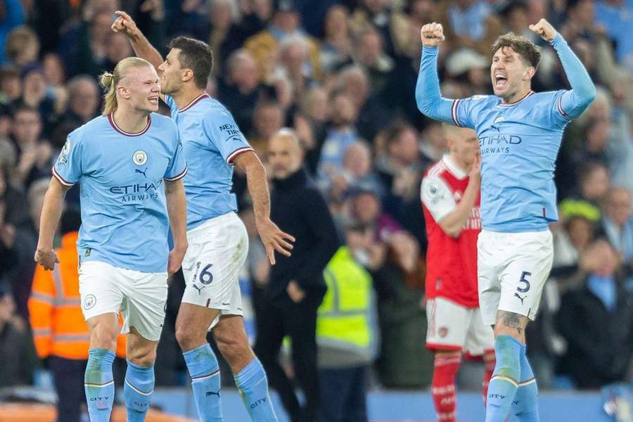 Manchester City players celebrate during their 4-1 victory over Arsenal