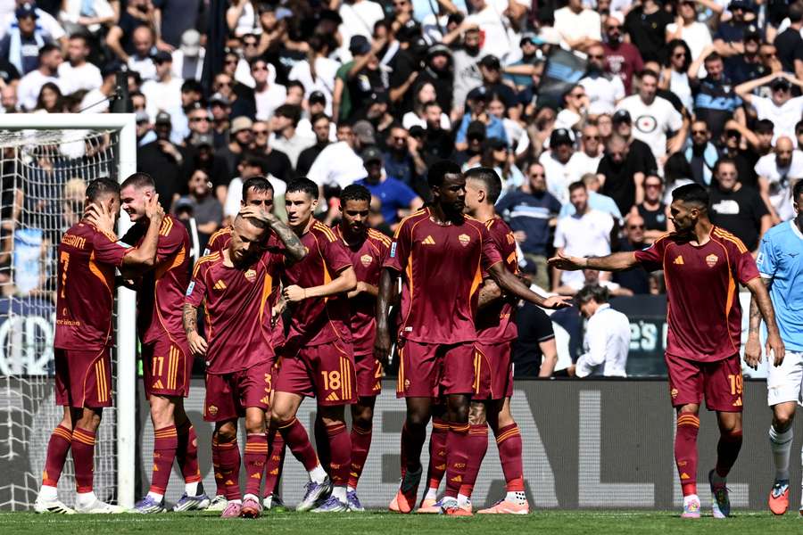 Roma celebrate their winning goal