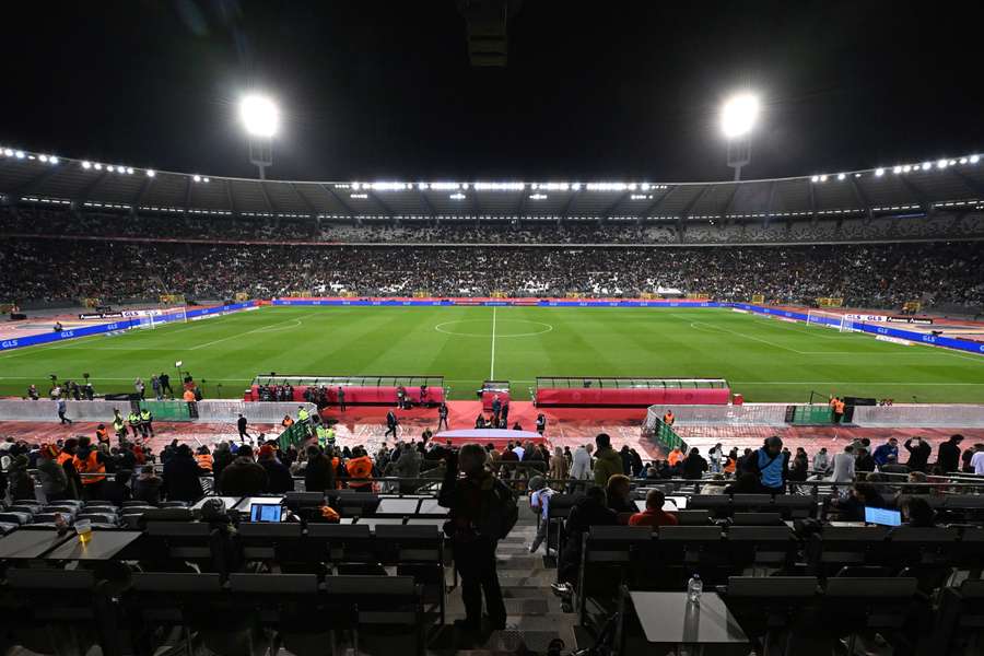 Supporters and officials wait in the stand after the Euro 2024 qualifying football match between Belgium and Sweden at the King Baudouin Stadium