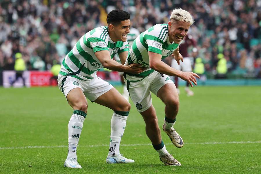 Luke McCowan of Celtic celebrates after scoring his team's second goal 