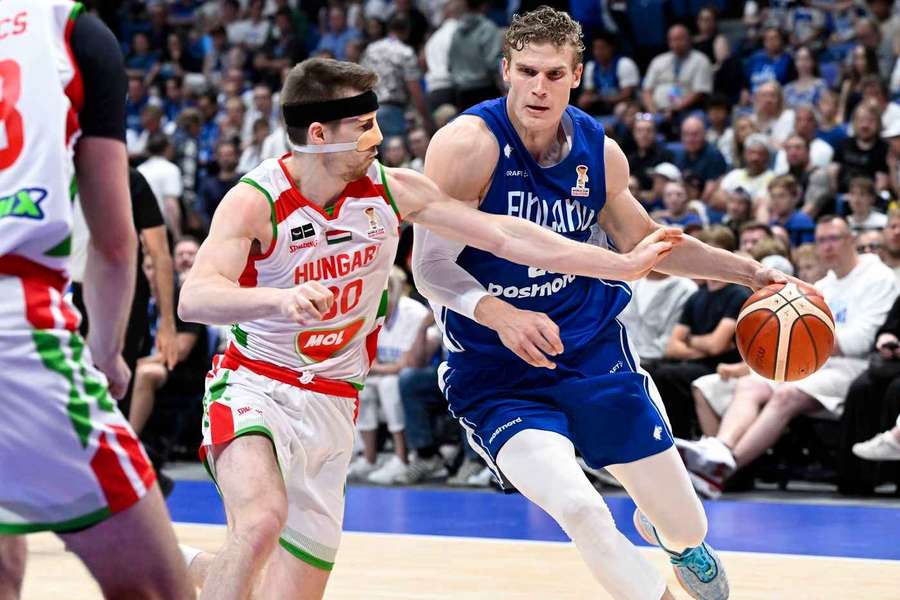 Markkanen drives to the basket in Finland's win Markkanen drives to the basket in Finland's win
