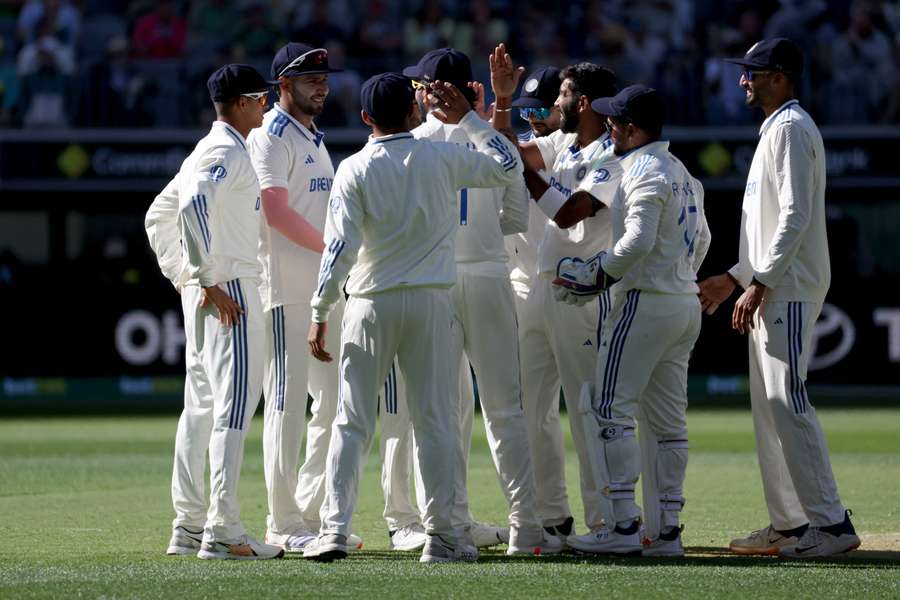 India's Jaspirit Bumrah celebrates the wicket of Australia's Usman Khawaja