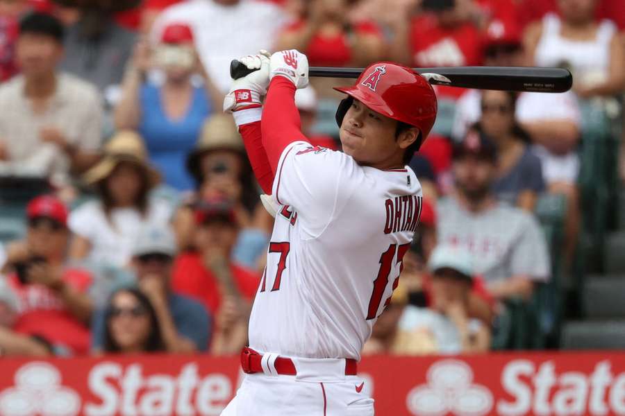 Ohtani hits a home run during the first inning against the Pittsburgh Pirates
