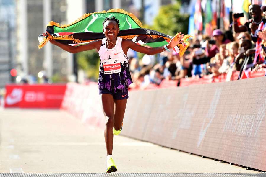 Ruth Chepngetich of Kenya celebrates after finishing first in the Chicago Marathon