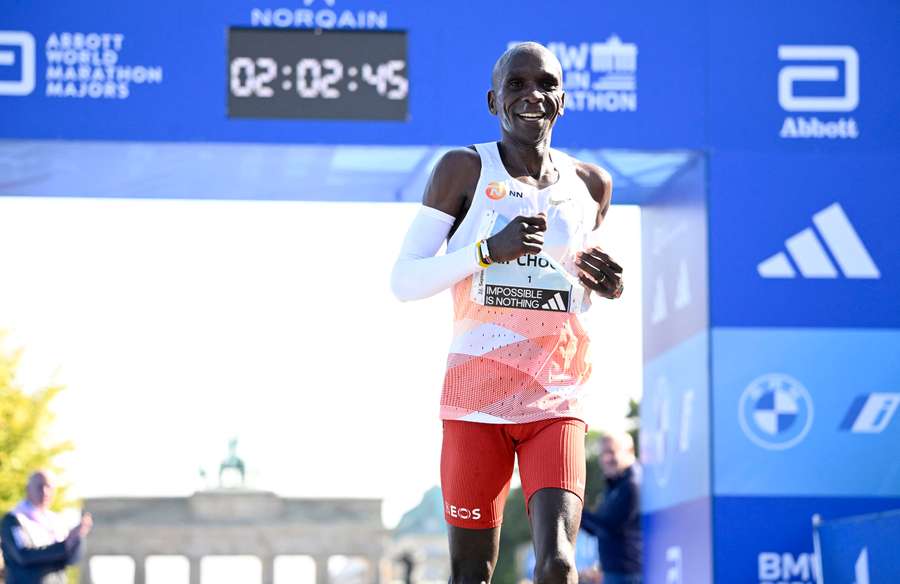 Kenya's Eliud Kipchoge smiles asfter crossing the finish line
