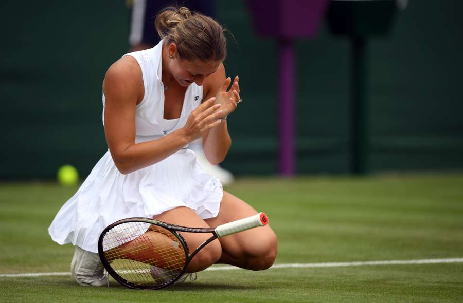 Ukraine's Marta Kostyuk celebrates beating Greece's Maria Sakkari during their women's singles tennis match