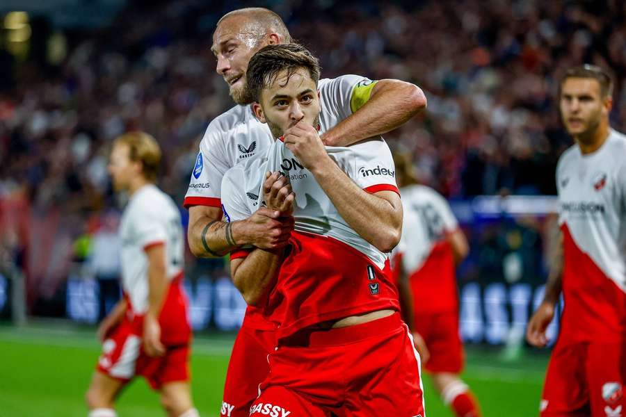 FC Utrecht's Souffian El Karouani kisses the badge after scoring the 3-1 against Heerenveen