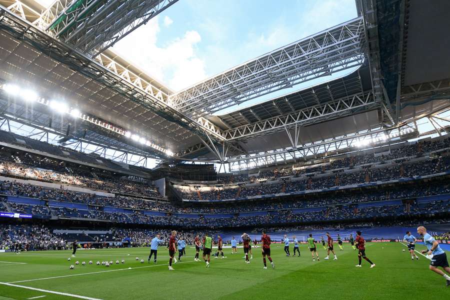 The players warm-up ahead of kick-off The players warm-up ahead of kick-off