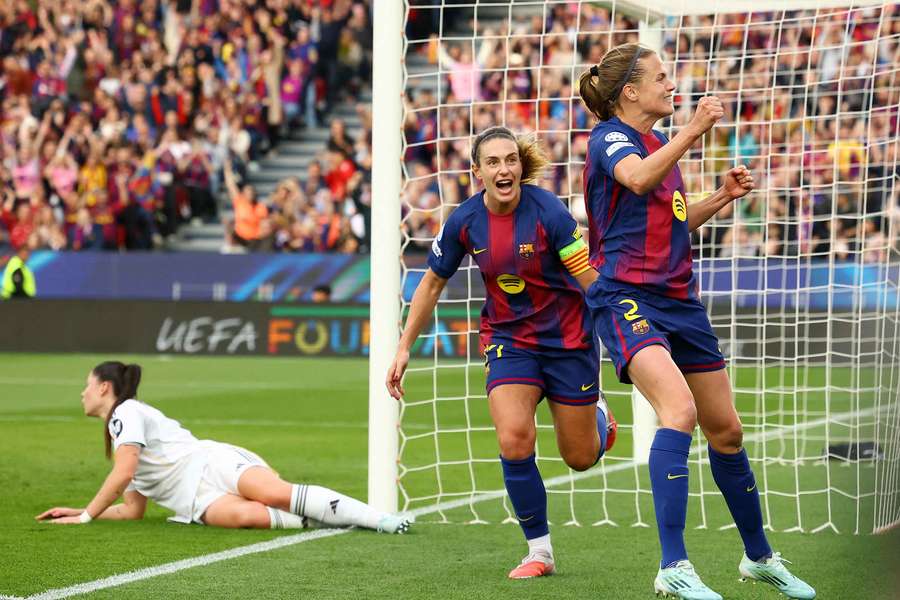 Barcelona's Irene Paredes celebrates scoring their third goal with Alexia Putellas 