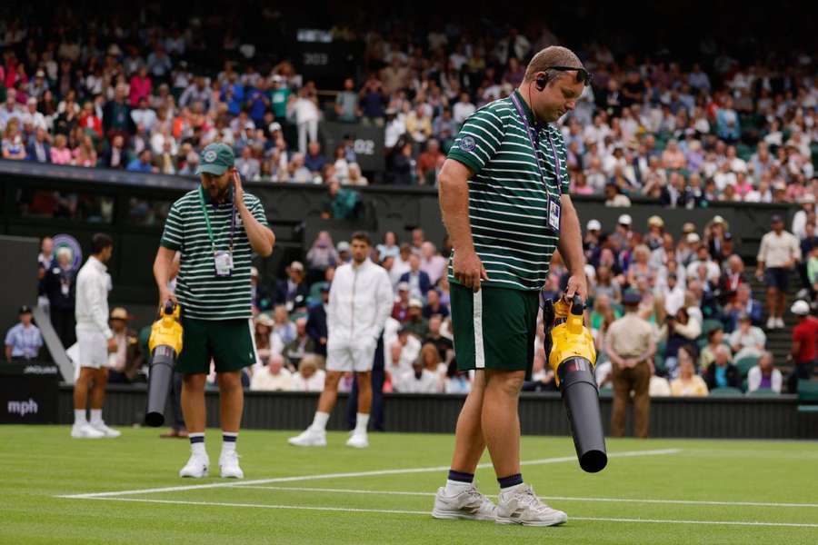 Leaf-blowers had to be deployed for the match to go on 