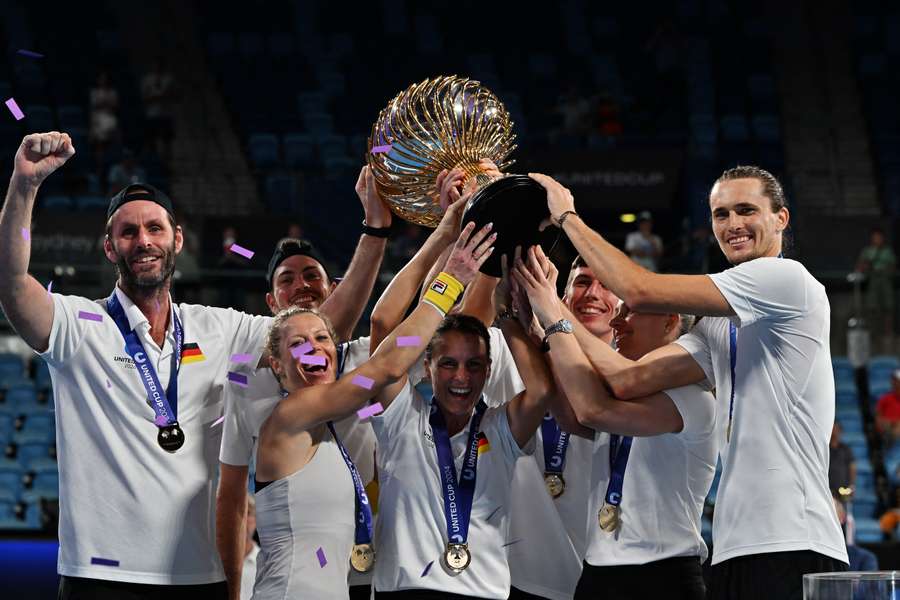 Germany celebrate with the trophy after defeating Poland in the final of the United Cup