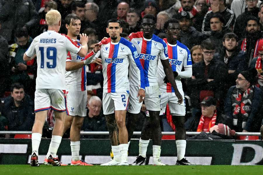 Ismaila Sarr (second right) reacts after scoring Crystal Palace's second goal against Liverpool Ismaila Sarr (second right) reacts after scoring Crystal Palace's second goal against Liverpool