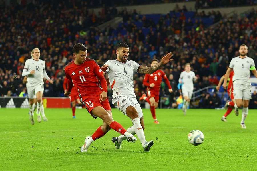 Wales' Brennan Johnson fires a shot goalward