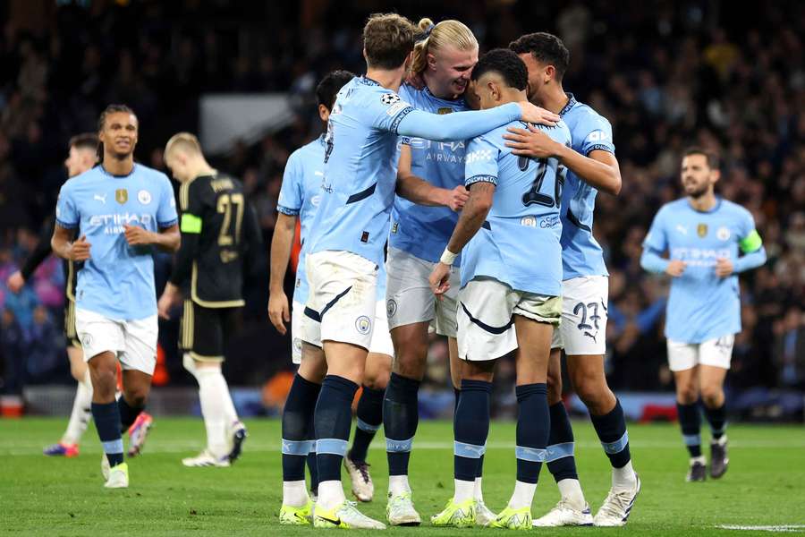 Erling Haaland celebrates with teammates after scoring a sensational second goal against Sparta Prague