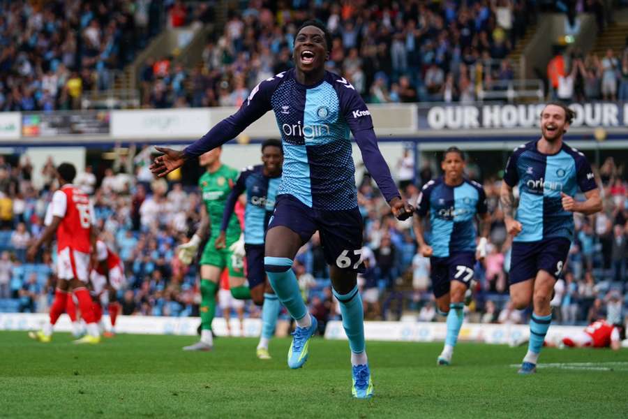 Olabiyi celebrates for Wycombe