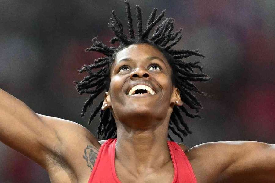 Marileidy Paulino reacts after winning her third world title in the 400m