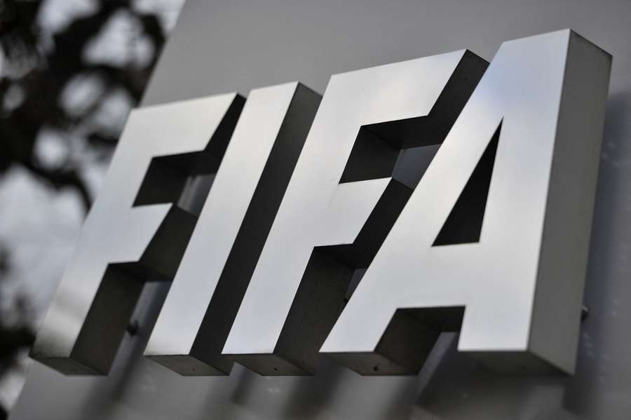 A FIFA logo next to the entrance of FIFA headquarters