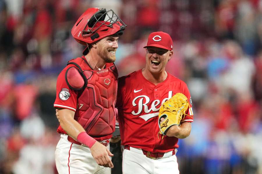 Cincinnati Reds Tyler Stephenson (left) and Emilio Pagan (right) react after win over Cubs (2025)