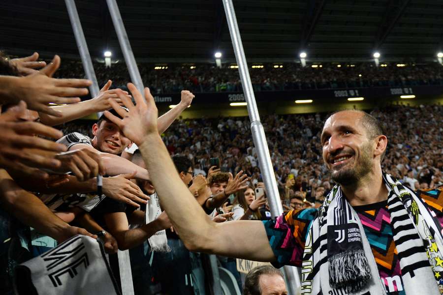 Juventus' Giorgio Chiellini with fans after playing his last home match for Juventus 