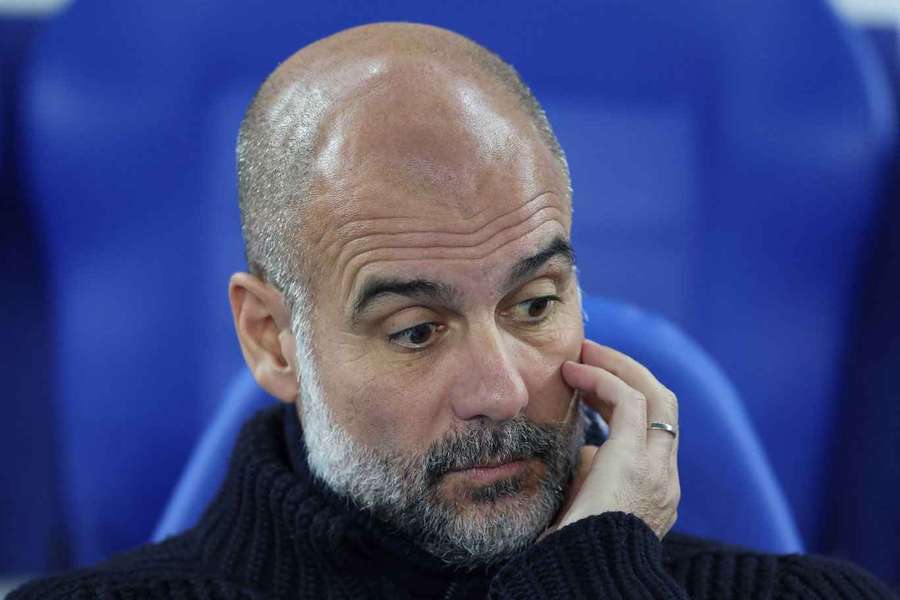 Guardiola reacts during City's match with Brighton