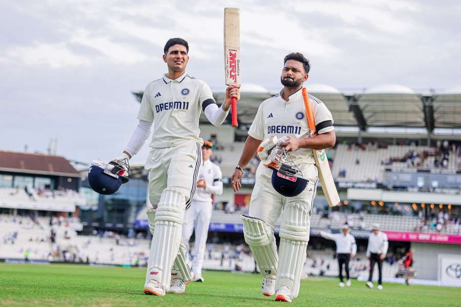 Gill and Pant walk off after day one