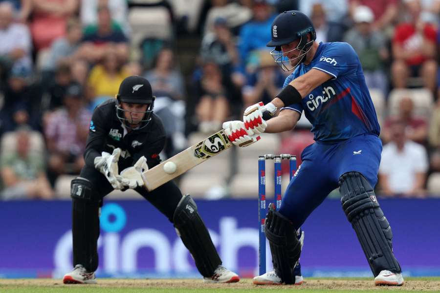 England's Liam Livingstone (R) plays a shot as New Zealand's Tom Latham (L) keeps wicket