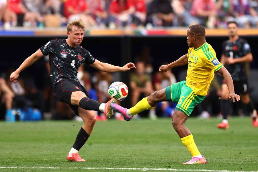Luc de Fougerolles, left, battles with South Africa's Iqraam Rayners Luc de Fougerolles, left, battles with South Africa's Iqraam Rayners