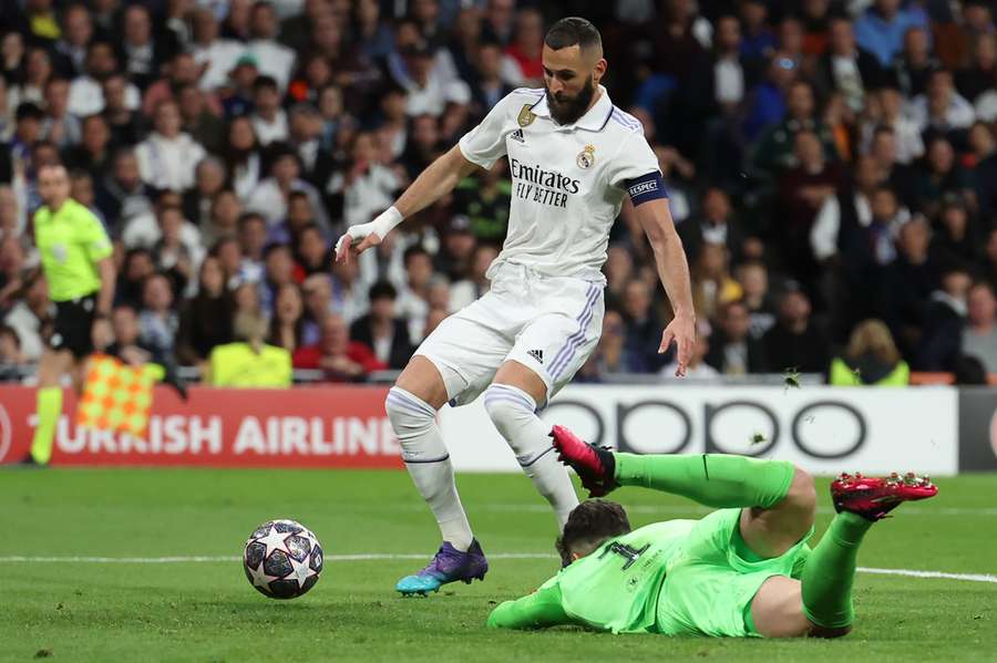 French forward Karim Benzema scores the opening goal for Real Madrid against Chelsea
