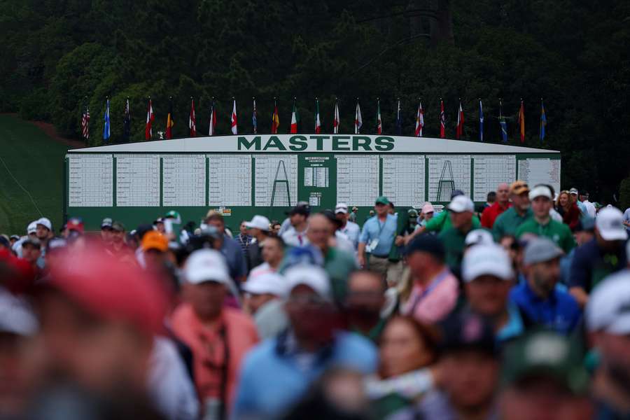 Spectators walk around the course as the action gets underway