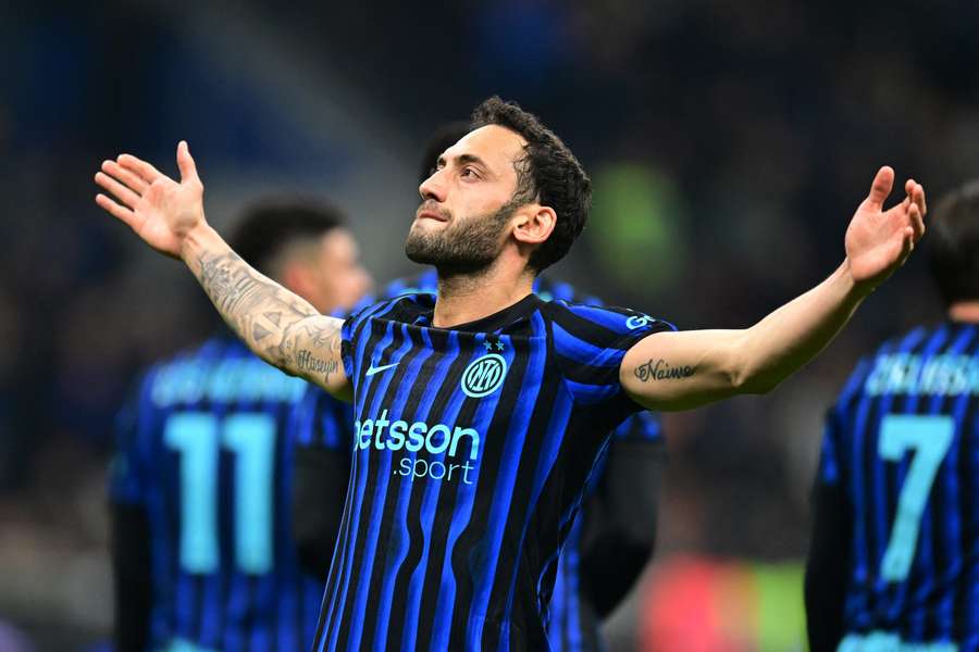 Inter Milan's Hakan Calhanoglu celebrates scoring against Genoa