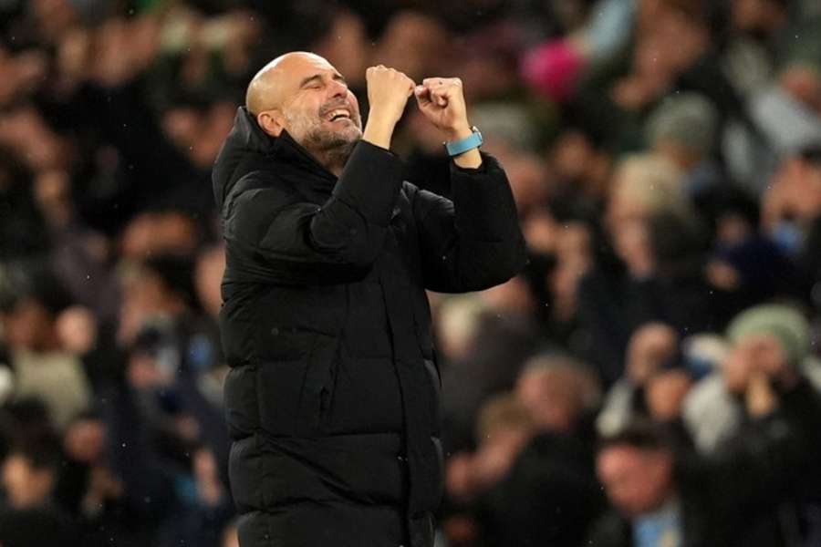 Manchester City manager Pep Guardiola reacts after Manchester City's Jeremy Doku scores his side's third goal 