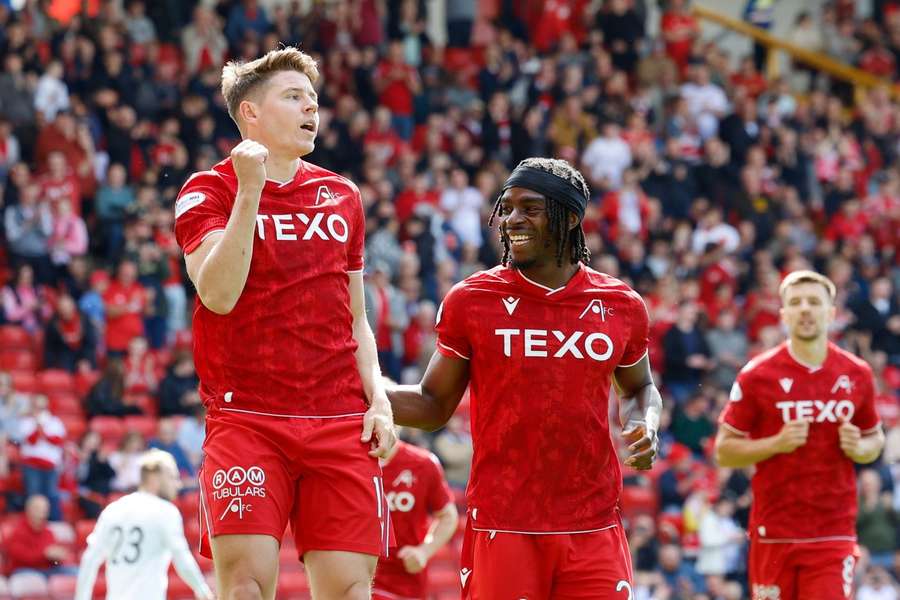 Hearts suffer more misery as Aberdeen snatch late victory Hearts suffer more misery as Aberdeen snatch late victory