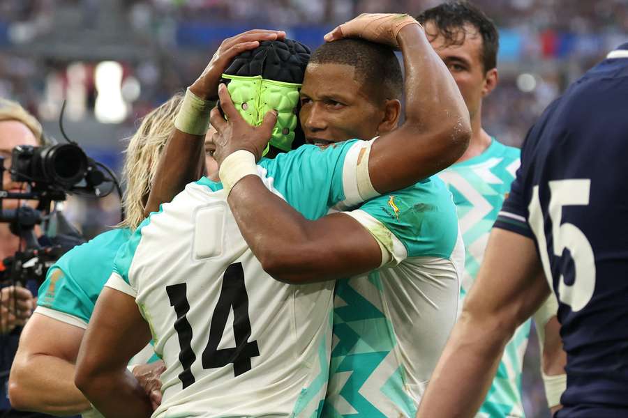 South Africa's Kurt-Lee Arendse celebrates with Manie Libbok after scoring a try