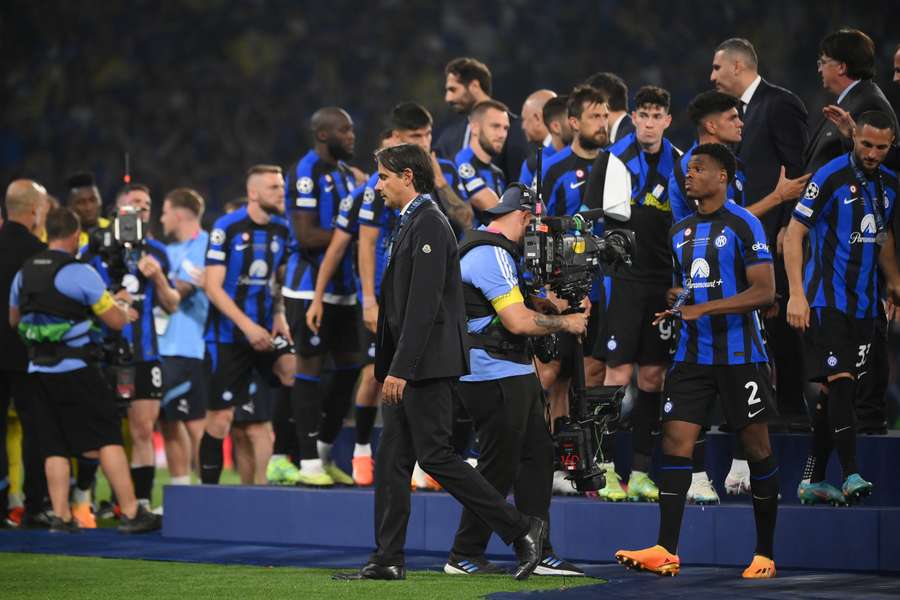 The Inter squad walk away after getting their second-place medals