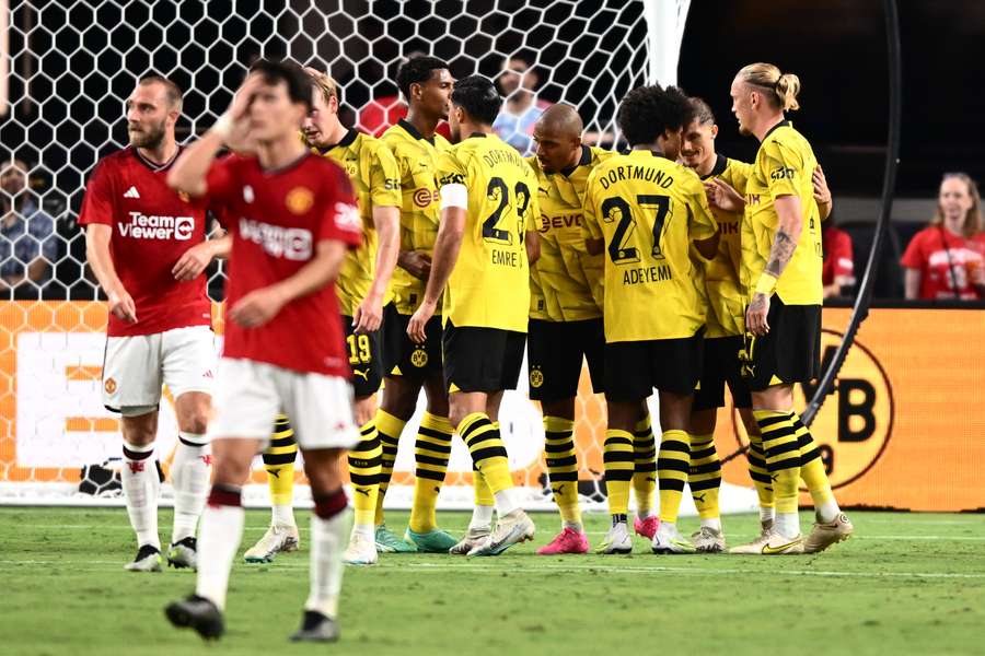 Dortmund's players celebrate against United