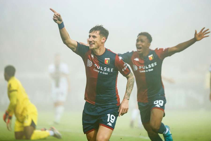 Genoa's Andrea Pinamonti celebrates after scoring