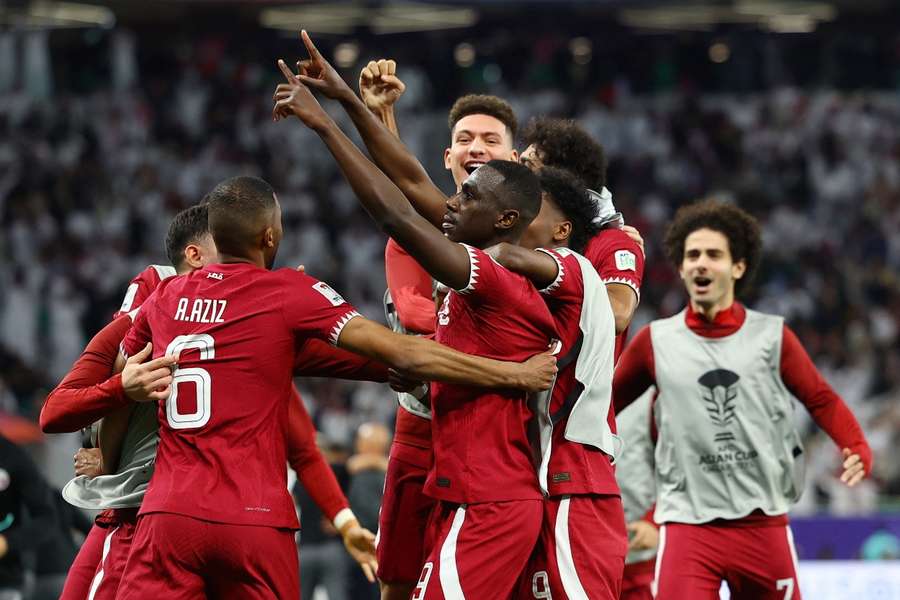 Qatar celebrate during the semi-final