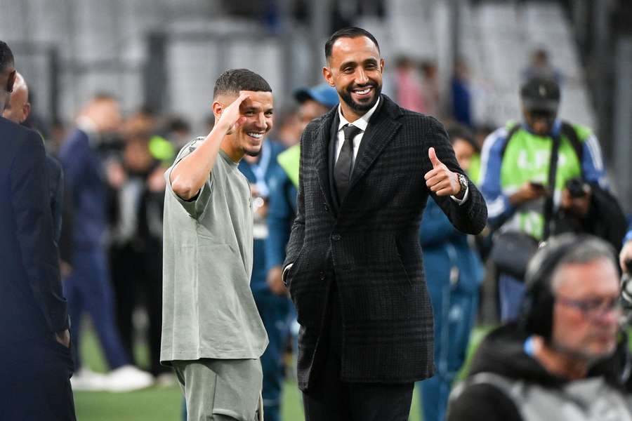 Mehdi Benatia con Amine Harit