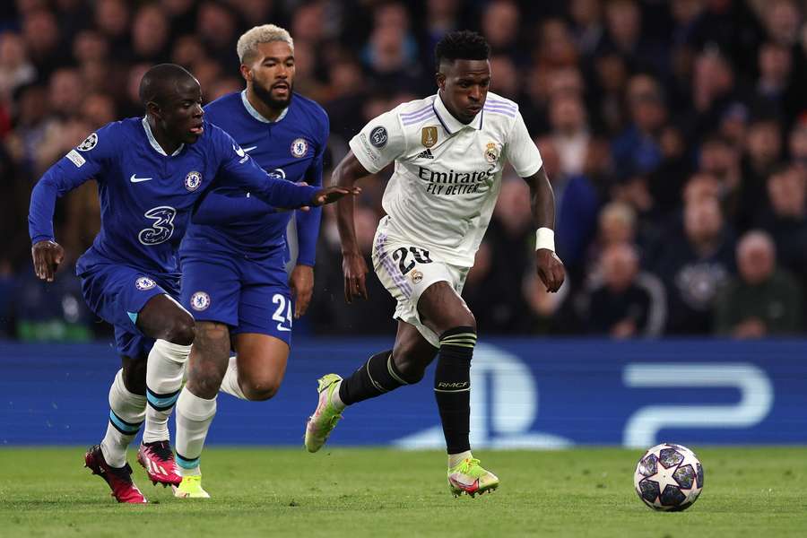 Chelsea's French midfielder N'Golo Kante and Chelsea's English defender Reece James vie with Real Madrid's Brazilian striker Vinicius Junior Chelsea's French midfielder N'Golo Kante and Chelsea's English defender Reece James vie with Real Madrid's Brazilian striker Vinicius Junior