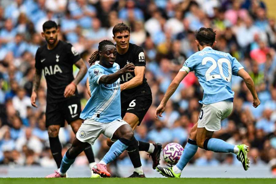 Manchester City's Jeremy Doku under pressure from Tottenham's Joao Palhinha Manchester City's Jeremy Doku under pressure from Tottenham's Joao Palhinha