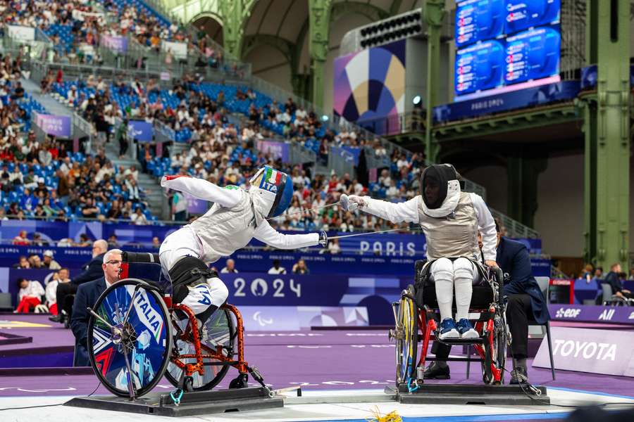 Bebe Vio competes against Nadiia Doloh of Ukraine during the women's foil category B quarter-final