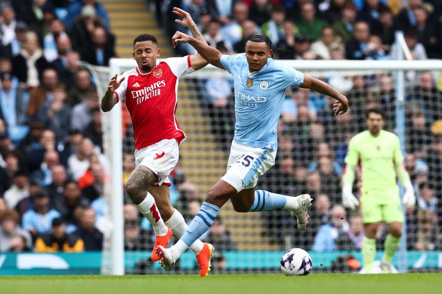 Jesus and Akanji fight for the ball